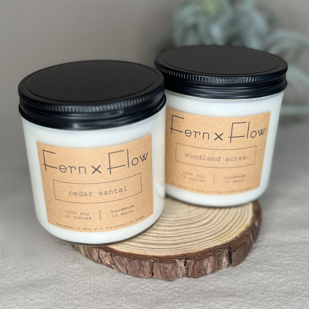 
                  
                    Fern x Flow 16oz Warm and Woodsy vegan soy candle bundle and gift set featuring Cedar Santal and Woodland Acres scented soy candles.
                  
                