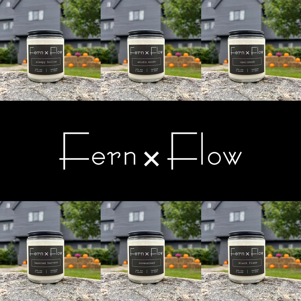 Fern x Flow Halloween Candle Collection, featuring six Halloween-inspired vegan, soy candles all in front of the Salem Witch House in Salem, Massachusetts